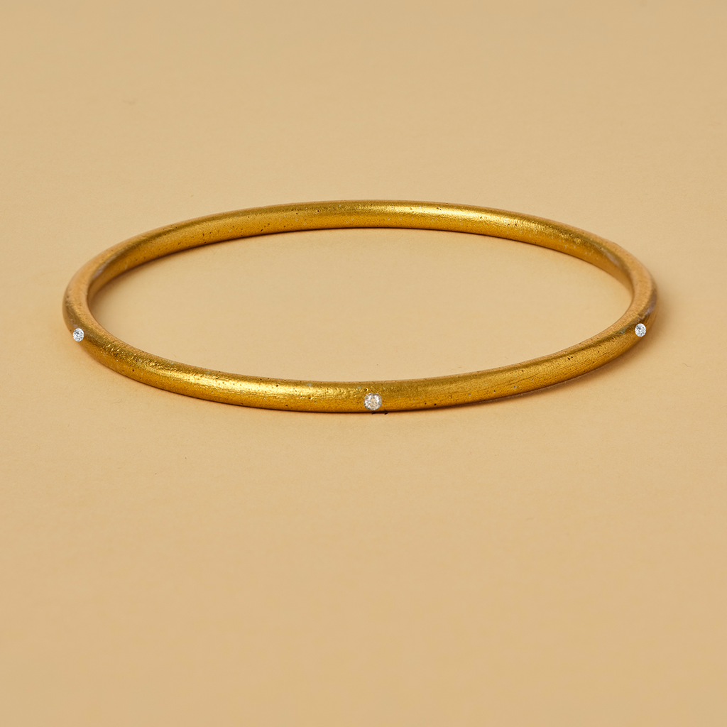 7 DIAMOND LOVE IS THE BOMB BANGLE