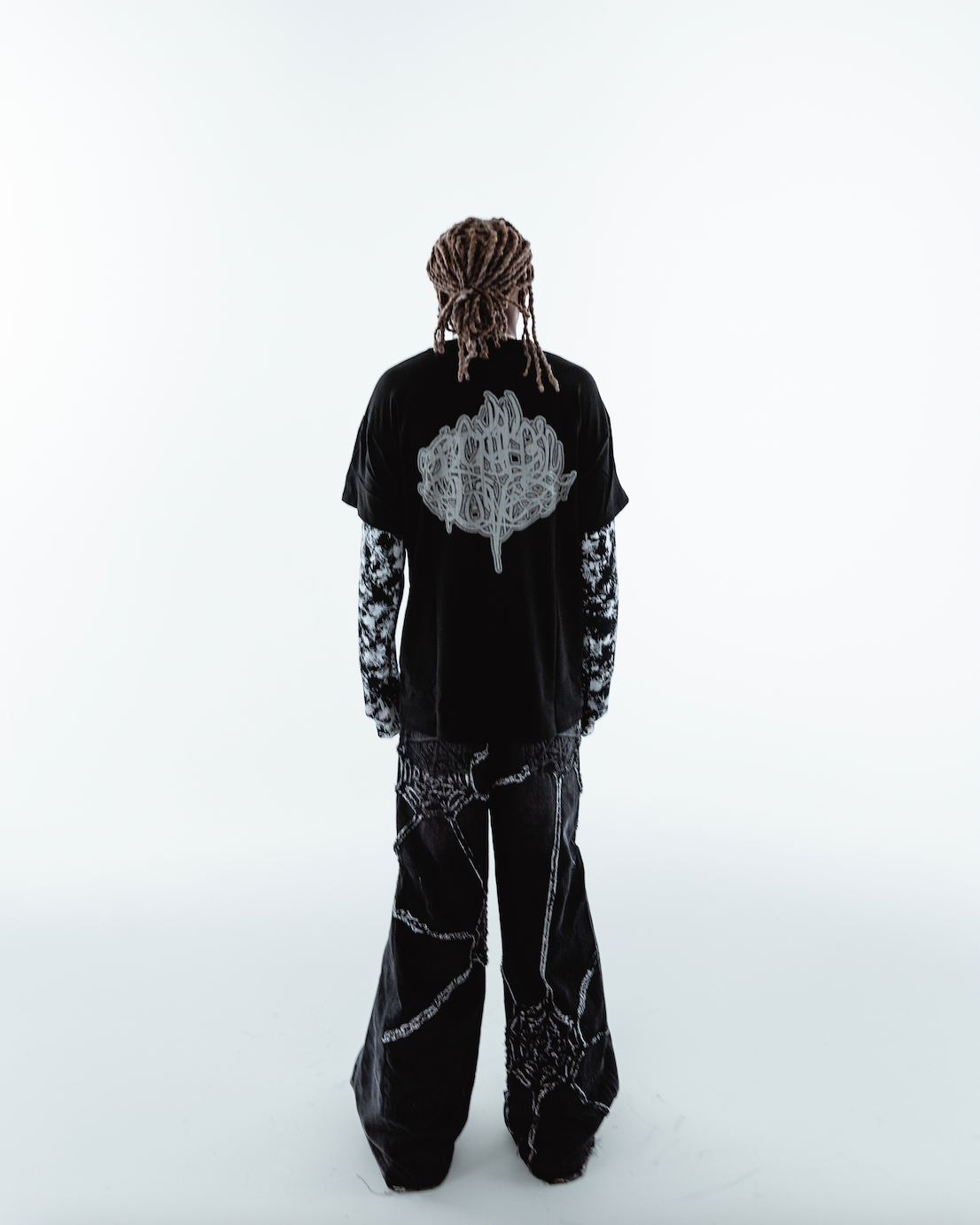 BL OVERLAPPING DIVINITY TEE WITH CAMO MESH SLEEVES